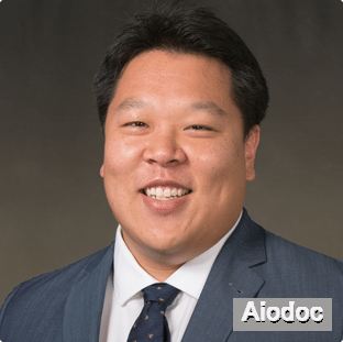 J. Andy Tau, MD